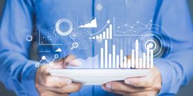 man holding image of data